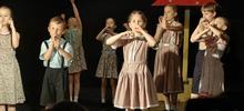 На подмостках "Гелиоса" юные звёздочки из мастерской Екатерины Витальевны  Константиновой представили свою первую работу "А у нас во дворе!"